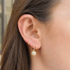 Boucle d'oreille pendante en argent plaqué or 18 carats avec pierre turquoise sertie
