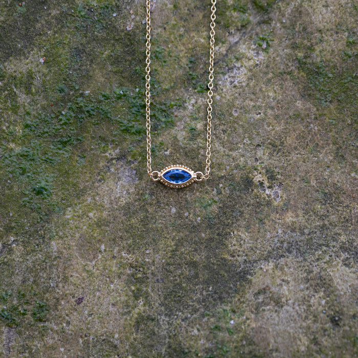 Collier avec zircone bleue en forme d'oeil en argent plaqué or 18 carats